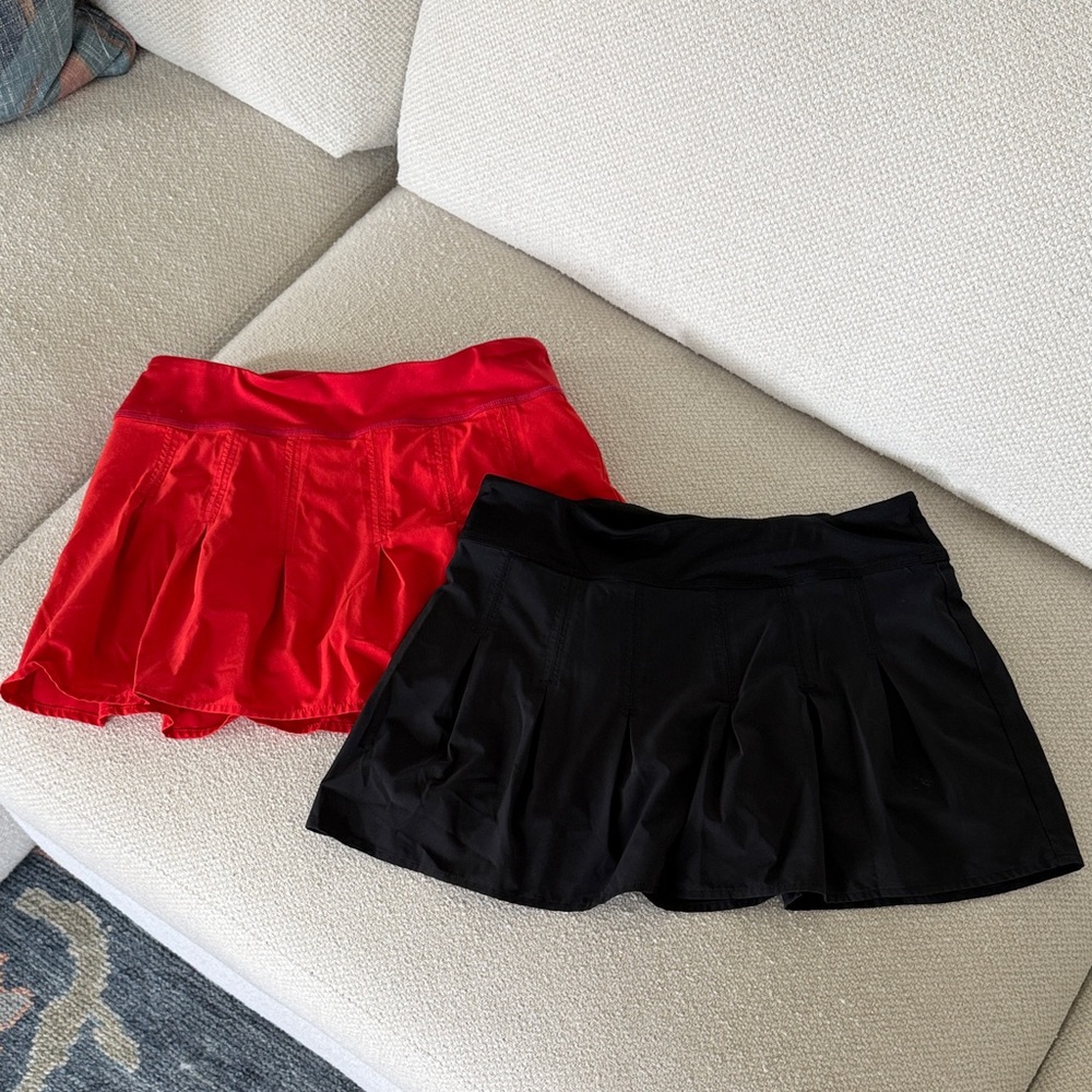Athleta Red and Black Pleated Mini Skirts